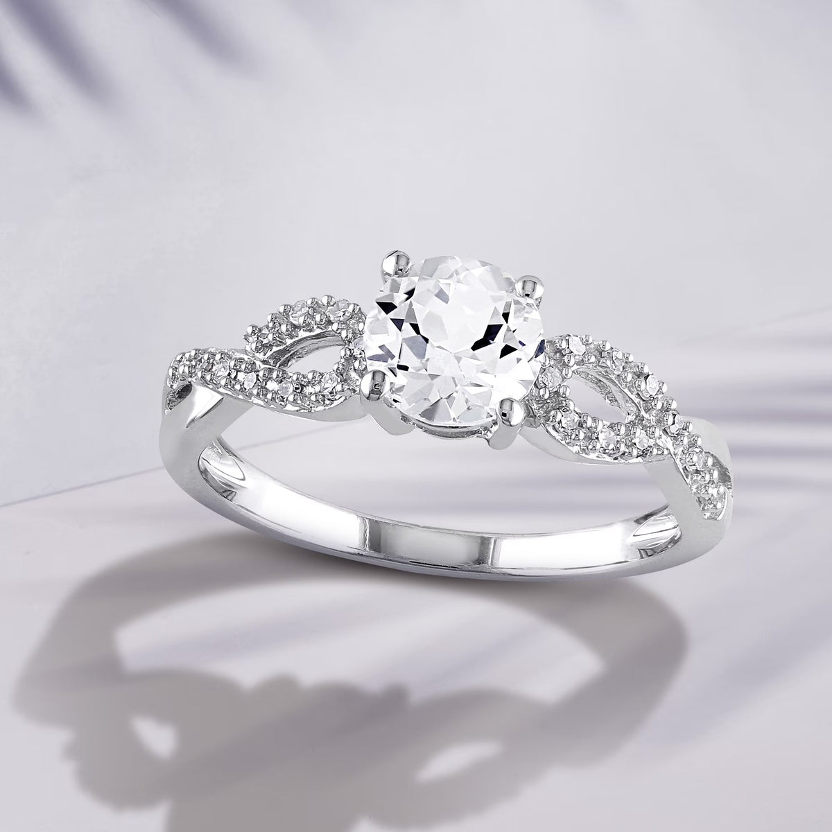 10kt White Gold Solitaire Ring with Infinity Band Y313875